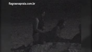 I filmed a couple having sex on the beach at night. A security guard put them to run